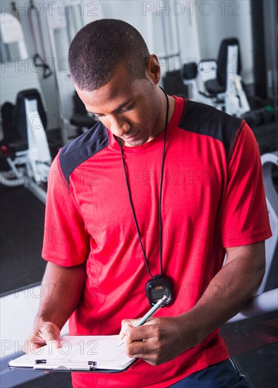 Athletic young man in gym