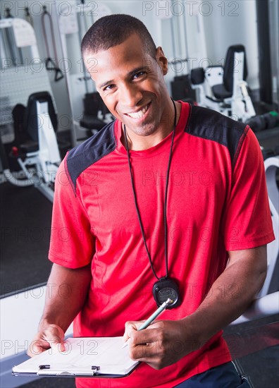 Athletic young man in gym