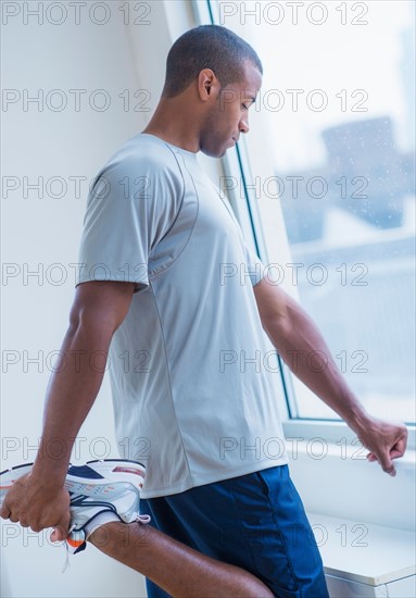 Athletic young man in gym