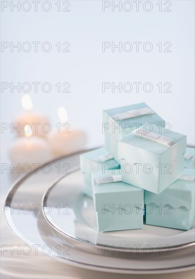 Pastel composition with gifts packages and candles