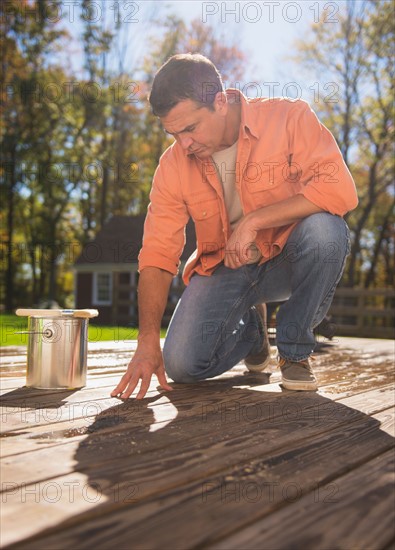 Portrait of man looking at porch