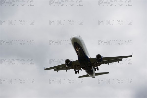 Low angle view of flying airplane