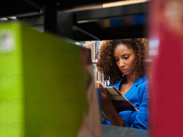 Woman researching library