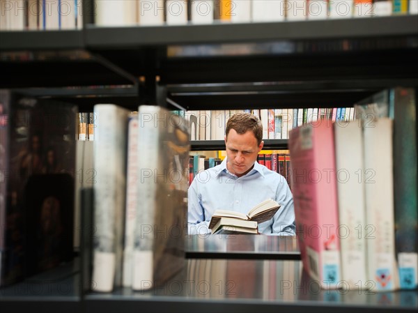 Man researching library