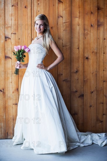 Portrait of bride holding bouquet