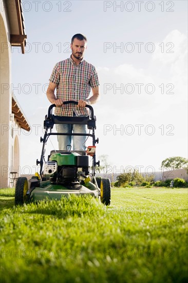 Man mowing lawn