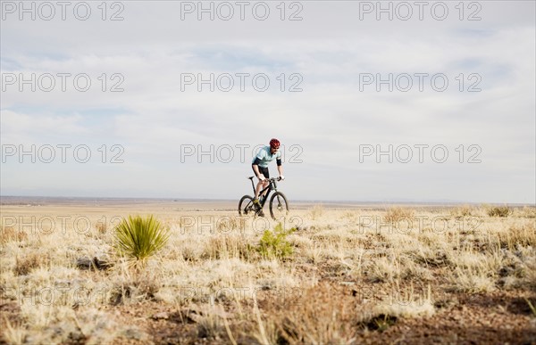 Male mountain biker on trail