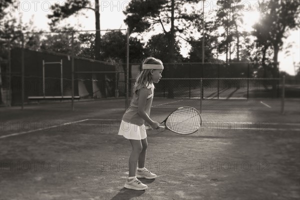 Girl playing tennis