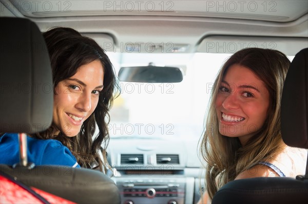 Two young women in car. Photo: Jamie Grill