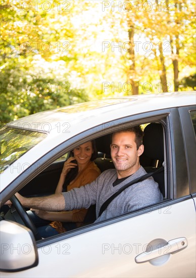 Couple in car. Photo : Jamie Grill