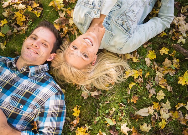 Couple lying on grass. Photo: Jamie Grill