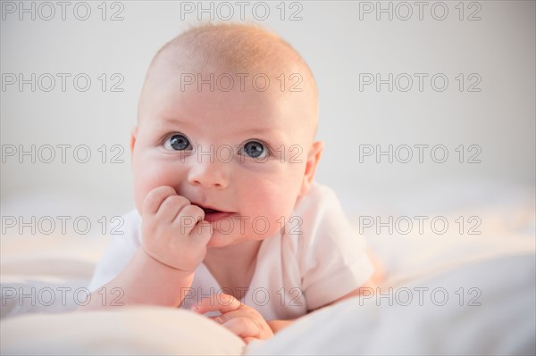 Portrait of baby boy (2-5 months). Photo : Jamie Grill