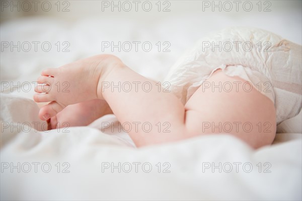 Legs of baby boy (2-5 months). Photo : Jamie Grill