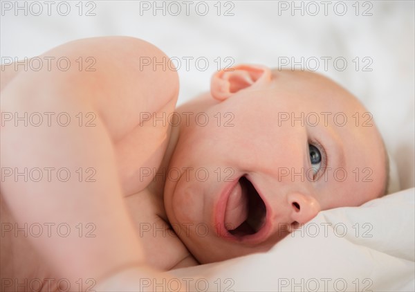 Baby boy (2-5 months) laughing. Photo: Jamie Grill