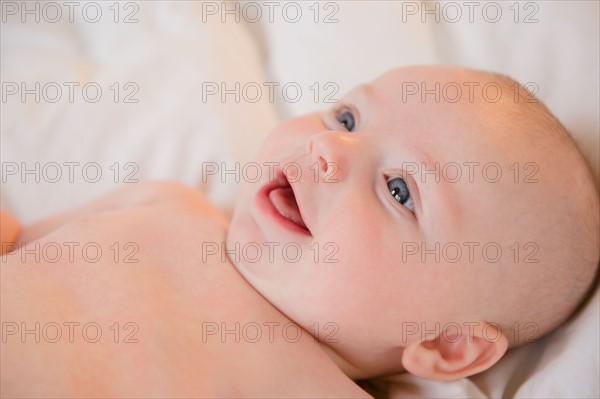 Smiling baby boy (2-5 months). Photo: Jamie Grill