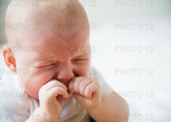 Baby boy (2-5 months) crying. Photo : Jamie Grill