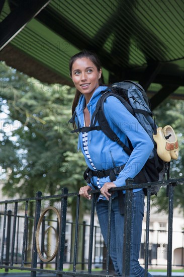 Portrait of young woman with backpack. Photo : Jan Scherders