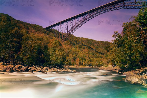 Bridge over river. Photo : Henryk Sadura