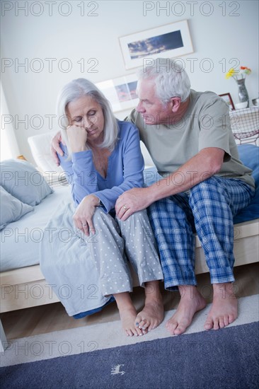 Senior couple after quarrel. Photo : Rob Lewine