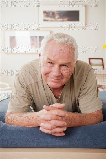 Portrait of smiling senior man . Photo : Rob Lewine