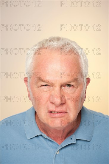 Portrait of senior man pulling funny face. Photo : Rob Lewine