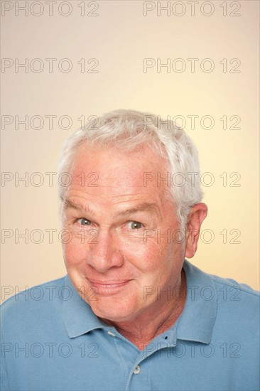 Portrait of senior man pulling funny face. Photo : Rob Lewine