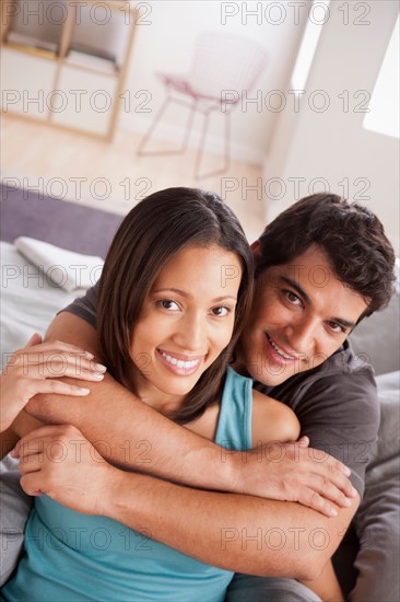 Couple in close embrace. Photo : Rob Lewine