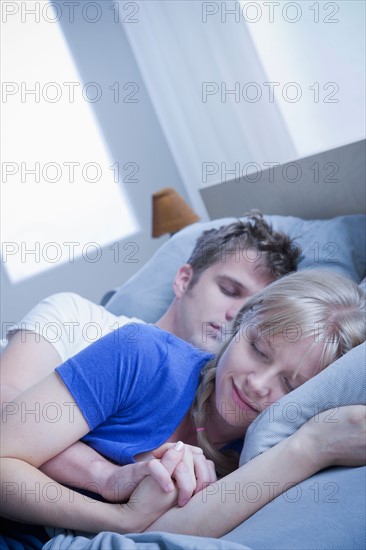 Close up of sleeping couple. Photo: Rob Lewine