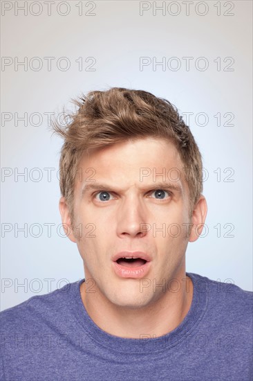 Portrait of man looking surprised. Photo: Rob Lewine