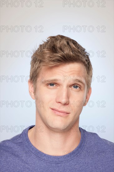 Portrait of man looking uncertain. Photo : Rob Lewine