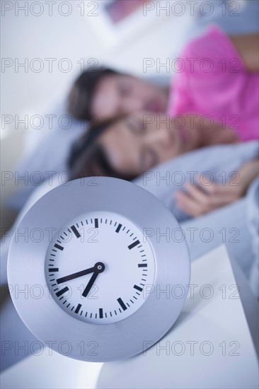 Close up of alarm clock on bedside table. Photo: Rob Lewine