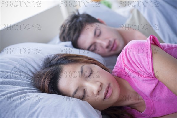 Close up of sleeping couple. Photo : Rob Lewine