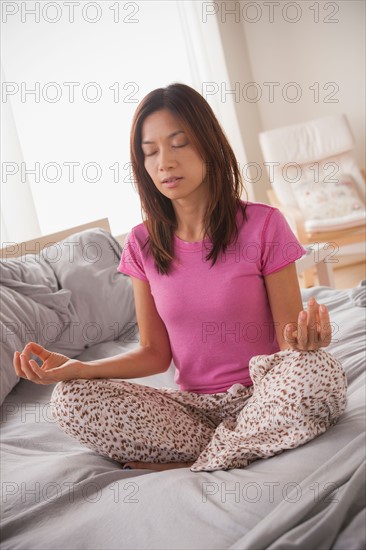 Portrait of woman doing yoga. Photo: Rob Lewine