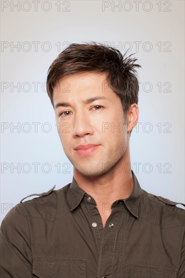 Portrait of man looking confused. Photo : Rob Lewine