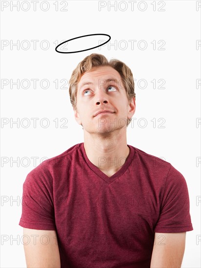 Portrait of man with halo drawn above his head. Photo: Jessica Peterson