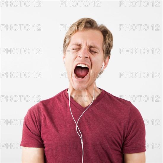 Man singing while listening to music. Photo: Jessica Peterson