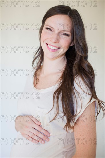Portrait of pregnant mid adult woman. Photo: Jessica Peterson