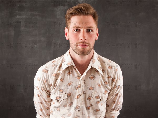 Studio portrait of young man. Photo : Jessica Peterson