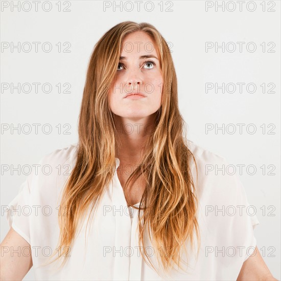 Studio portrait of young woman. Photo : Jessica Peterson