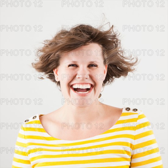Studio portrait of woman laughing. Photo: Jessica Peterson