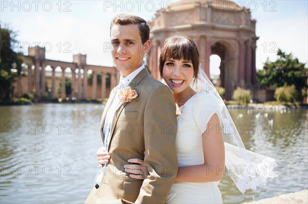 Portrait of young bride and groom. Photo : Jessica Peterson