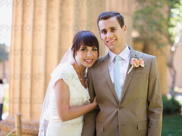 Portrait of young bride and groom. Photo : Jessica Peterson