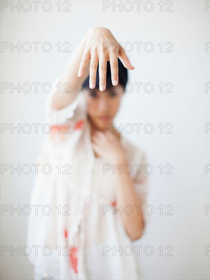 Studio Shot of dancing woman. Photo : Jessica Peterson