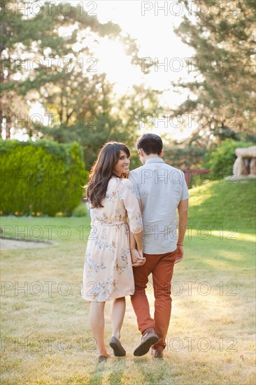 Couple walking in park. Photo: Jessica Peterson