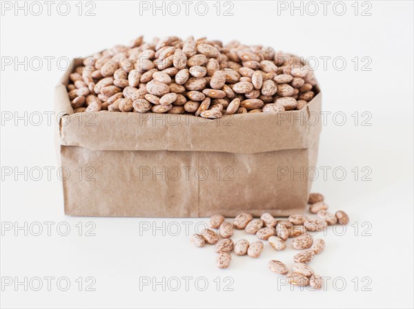 Carton of beans on white background. Photo: Jessica Peterson