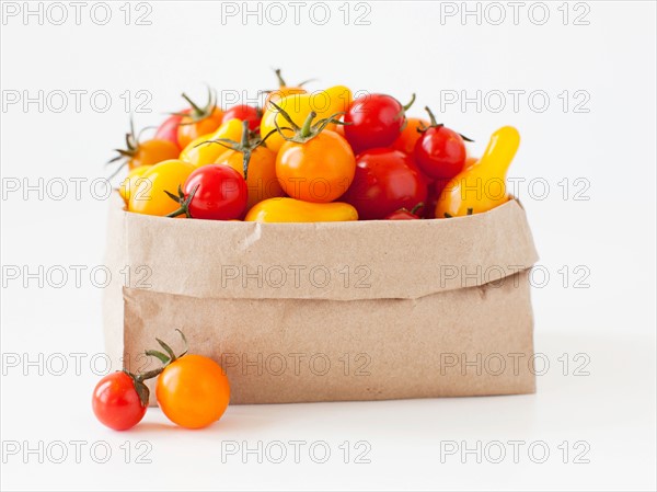 Studio Shot of Cherry Tomatoes in paper bag. Photo: Jessica Peterson