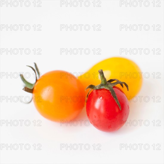 Studio Shot of three Cherry Tomatoes. Photo : Jessica Peterson