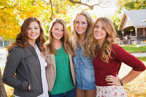 Waist up portrait of four friends. Photo: Jessica Peterson