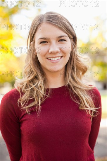 Portrait of young woman toothy smiling. Photo : Jessica Peterson