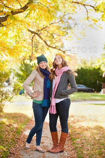 Portrait of two young women in autumn day. Photo : Jessica Peterson